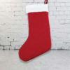A red Christmas stocking with white trim at the top and a red hanging loop.