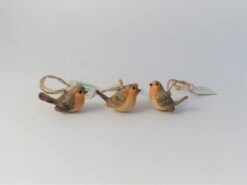 Three little resin robin tree decorations with twine hanging loop.