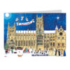 Advent calendar card featuring an illustration of a cathedral with angels flying above holding a banner saying Advent. A choir walks across the snow infront of the cathedral and the Northern Star shines brightly above.