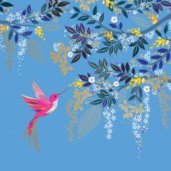 Bright blue card with a pink hummingbird splaying it's wings as it hovers next to tree branches covered in blue and yellow leaves.