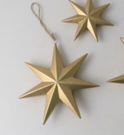 Gold star tree decoration with hanging loop.