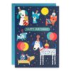 A dark blue card illustrated with cartoon dogs wearing party hats and holding balloons. Text reads 'Happy birthday'.