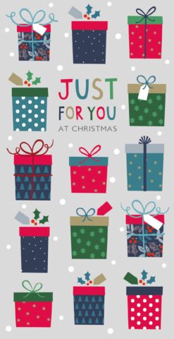 Money wallet with text Just for you at Christmas. The wallet is decorated with lots of gifts in different Christmas wrapping paper, ribbons and tags.