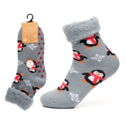 Ladies Christmas bed socks with gripper soles. This image shows grey socks with penguins and snowflakes and red gripper pads.