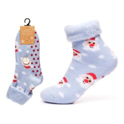Ladies Christmas bed socks with gripper soles. This image shows pale blue socks with Santa's and dots of snow and red gripper pads.