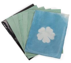 Sheets of sun print paper with different colours and pattens.