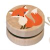 Wooden yo-yo with an orange fox design on the top.