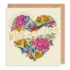 Mother's Day card with a beautiful illustration of a heart made out of bright, colourful flowers. Text above the heart reads 'Wishing you a Wonderful' and gold text across the centre of the heart reads 'Mother's Day'.