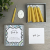 Thank You Mini Candle Gift Set containing mini beeswax candles and white ceramic holder. Comes in a presentation box with the text 'Just to say thank you so much. A little gift just for you. A box full of relaxation candles. Light one and focus on the flame.'