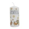 White pillar candle with the text Happy Easter at the top. Decorated with yellow chicks and daffodils and bunnies along the bottom.