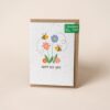 Plantable card with illustration of two bees buzzing around colourful flowers. Text below the image reads Happy Bee Day.