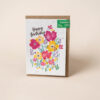Plantable card with colourful watercolour illustration of flowers. The text reads Happy Birthday.