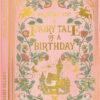 Book style birthday card. Pink with floral, fairytale decorations and a castle. Text reads Wishing you a fairty tale of a birthday.
