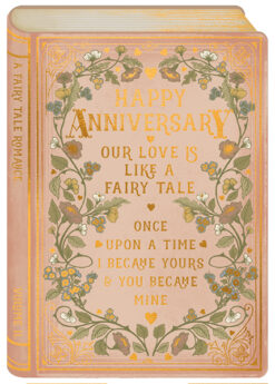 Book shaped card featuring the text Happy Anniversary, Our Love is Like A Fairy Tale, Once upon a time I became yours and you became mine. The card is pink with floral decorations and gold hearts.