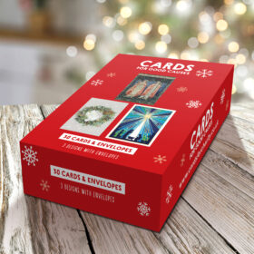 Image of a bumper box of Christmas cards with religious designs.