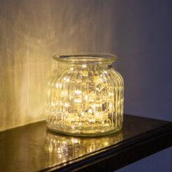 White fairy lights in a glass jar.