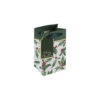 Small Christmas gift bag with holly design on a white background, green ribbon handles and gold and green tag.