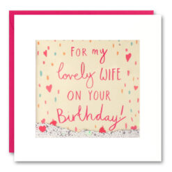 Square card with a window which contains glitter and confetti. Text reads For my lovely Wife on your birthday. The window is decorated with hearts.