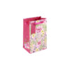 Small pink gift bag with colourful floral design. Pink handles and gift tag.