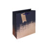 Medium sized gift bag in navy and copper with a copper gift tag attached.