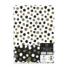 White wrapping paper sheets with black and gold dots. Black gift tags with white and gold dots.