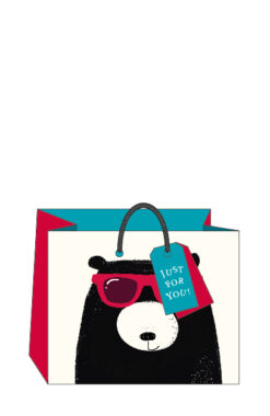 Medium sized gift bag with an illustration of a black bear wearing glasses. There is a gift tag attached to the bag.