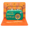Orange card with a pop out blue radio which has the text 'a true classic just like you' on the front.