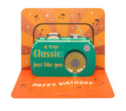 Orange card with a pop out blue radio which has the text 'a true classic just like you' on the front.