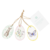 Three wooden easter decorations with hanging string. Each with different design including a rabbit, butterfly and flowers.