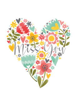 A white card decorated with a large heart which is filled with colourful flowers and the text Miss you.