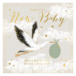 A new baby card with a pastel sky background. An illustration of a stork carrying a grey bag with white spots. Gold text reads 'Beautiful new baby. Welcome to the world little one'. Gold hearts and dots decorate the card.