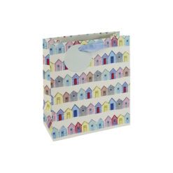 Gift bag with a pattern of colourful beach huts in rows. The bag has blue handles and a circular gift tag.