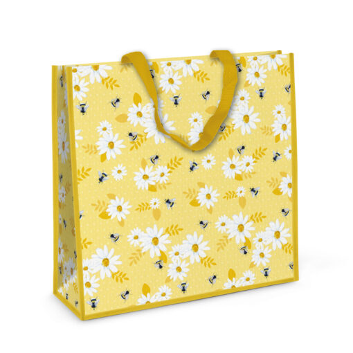 Yellow woven textile bag with a flowers and bees pattern.