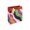 Medium sized gift bag with a bright colourful wave design. The bag has blue handles and a rectangular gift tag attached.