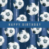 Birthday card with a blue background and a pattern of white and black footballs. A banner across the centre contains the text 'Happy Birthday'.