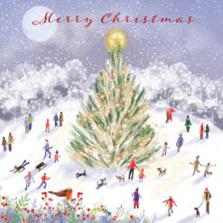Christmas card with people playing in the snow around a large twinkling Christmas tree
