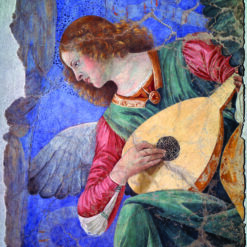 Christmas card with an image of an angel playing a lute