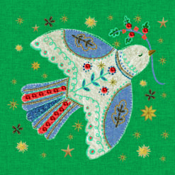 Christmas card with an image of an embroidered dove carrying a sprig of holly in its beak