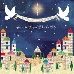 Christmas card with an image of two doves holding a banner with musical notes above a Bethlehem scene with the manger