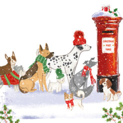Christmas card with an image of many different dogs next to a red postbox