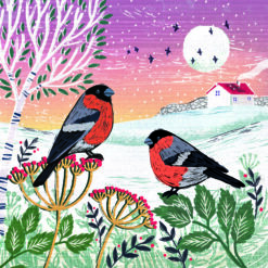 Christmas card with an image of two bullfinches sitting on winter flowers in a snowy scene