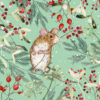 Christmas card with an image of a mouse amongst some foliage including berries
