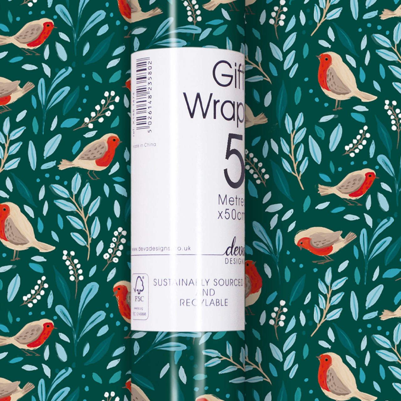 Christmas Wrapping paper with Robins and green foliage