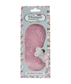 The Vintage Cosmetic Company gel eye mask. The mask is pink and is in a blue packet with floral border. Text on the box reads 'I can be used hot or cold' and 'comfy and adjustable'.