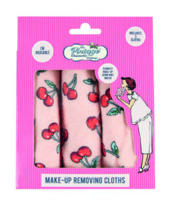 A pack of 3 make up removal cloths which are pink and have a red cherry pattern. Text on the packet reads 'I'm reusable' and 'Removes make up using only water'.