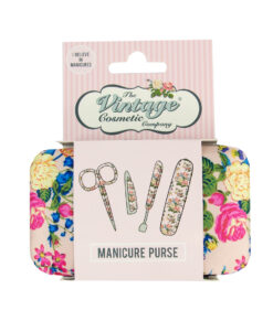 A pink manicure purse with colourful floral pattern. Text on the packaging reads 'I believe in manicures'. From The Vintage Cosmetic Company.