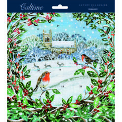 A square advent calendar featuring an illustration of a church surrounded by tree and snow covered fields. A wreath frames the image with two robins perched on the branches.