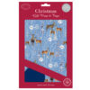 Blue Christmas wrapping paper with deer, snowy trees, and moonlit woodland scene; includes matching tags in eco-friendly packaging.