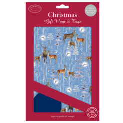 Blue Christmas wrapping paper with deer, snowy trees, and moonlit woodland scene; includes matching tags in eco-friendly packaging.