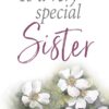 A white book with an illustration of white flowers and the words, 'To a very special Sister', on the front